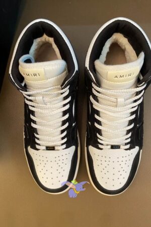 Amiri Skel Top High-Top Sneakers in Black and White Leather.