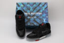 A pair of black Louis Vuitton LV Trainer sneakers with grey monogram patterns and red accents