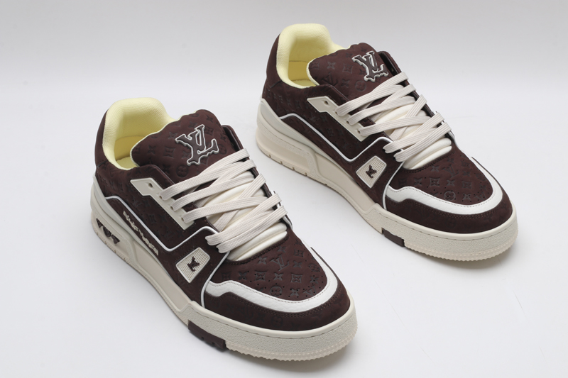 A single brown Louis Vuitton LV Trainer Low-Top Sneaker, showcasing its embossed monogram suede and off-white accents.