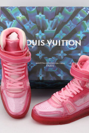 A pair of translucent pink Louis Vuitton LV Trainer Up high-top sneakers with velcro straps, light pink laces, and a pink sole