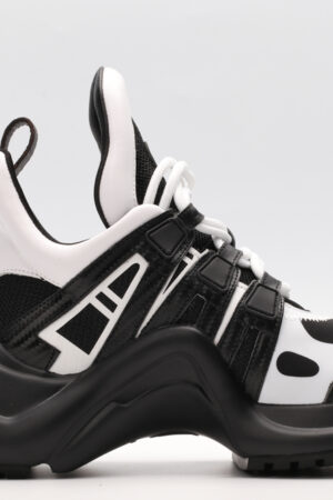 A pair of translucent light pink low-top sneakers with darker pink accents, pink laces, and a visible internal structure, displayed on a white background.