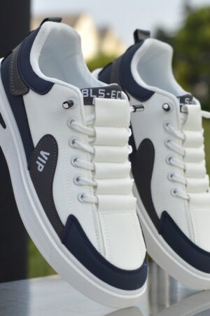 A low-top unisex casual sneaker with a white leather-like upper and a simple, classic design, featuring a LIGE logo on the tongue.