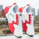 A pair of black and white unisex sneakers with a chunky, sculpted sole and the SIN1982 brand logo on the side.