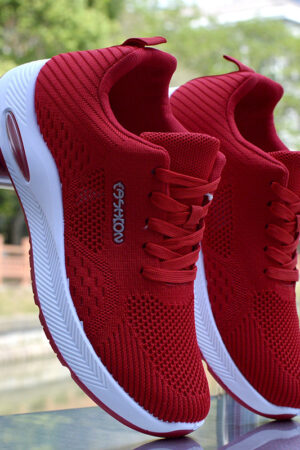 A pair of low-top unisex casual sneakers in a clean, modern design with a textured upper and comfortable sole.