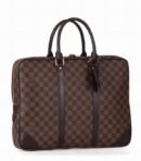 A high-quality Louis Vuitton inspired Porte-Documents Voyage briefcase in brown and tan Damier Ebene canvas with dark brown leather trim.