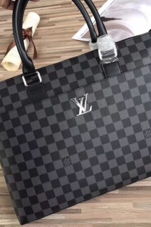 A high-quality Louis Vuitton inspired Anton briefcase in black and charcoal Damier Graphite canvas with a silver logo and black leather handles.