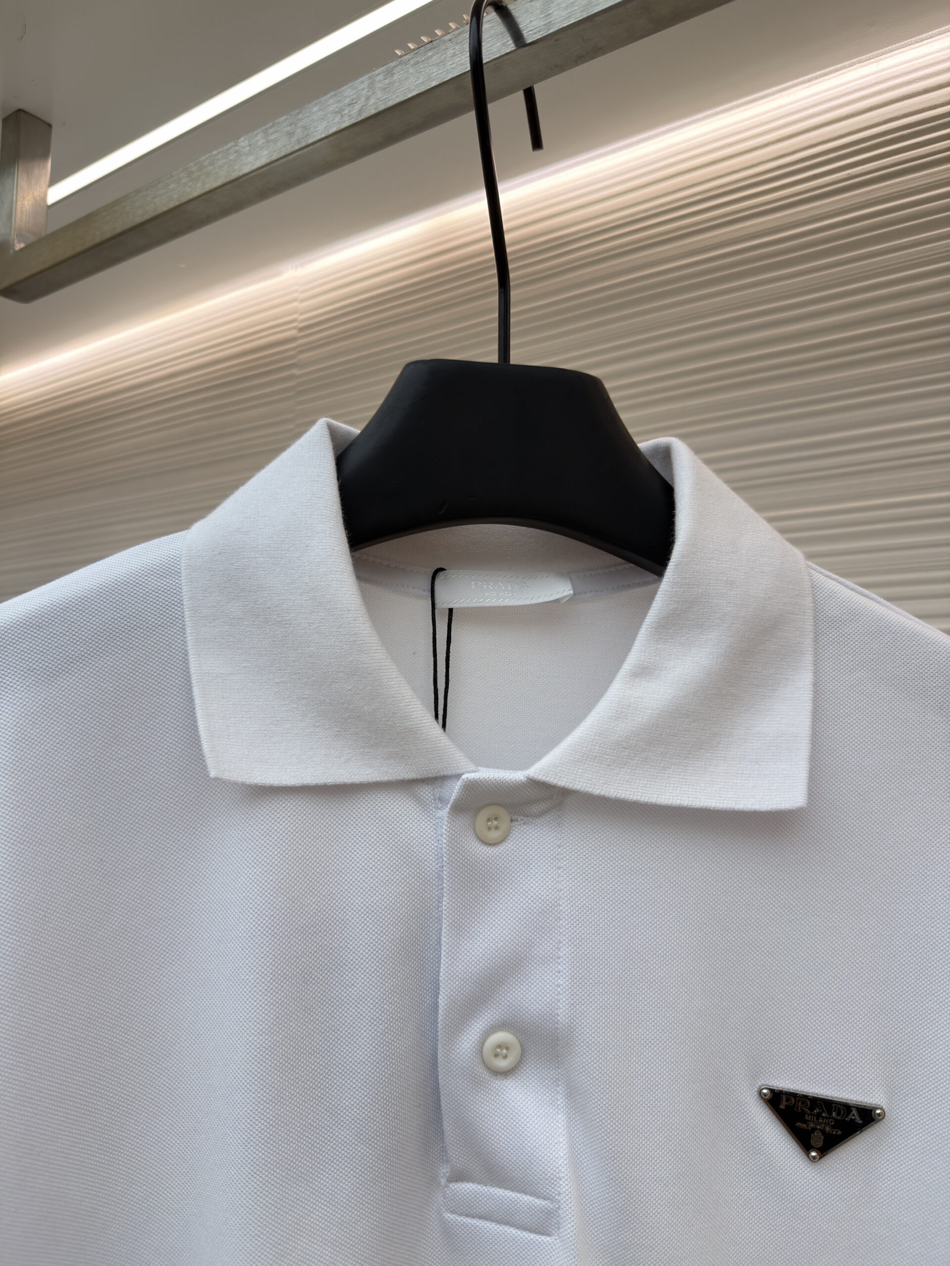 Prada Inspired White Triangle Logo Polo - Image 2