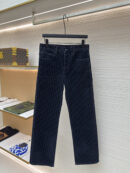A pair of dark navy denim jeans featuring an all-over Dior Oblique monogram pattern in a slim-straight cut.