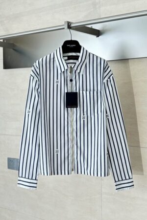 A premium men's white t-shirt featuring a large black Valentino VLogo signature on the chest, and a premium black t-shirt with a subtle pink embroidered VLogo on the left chest