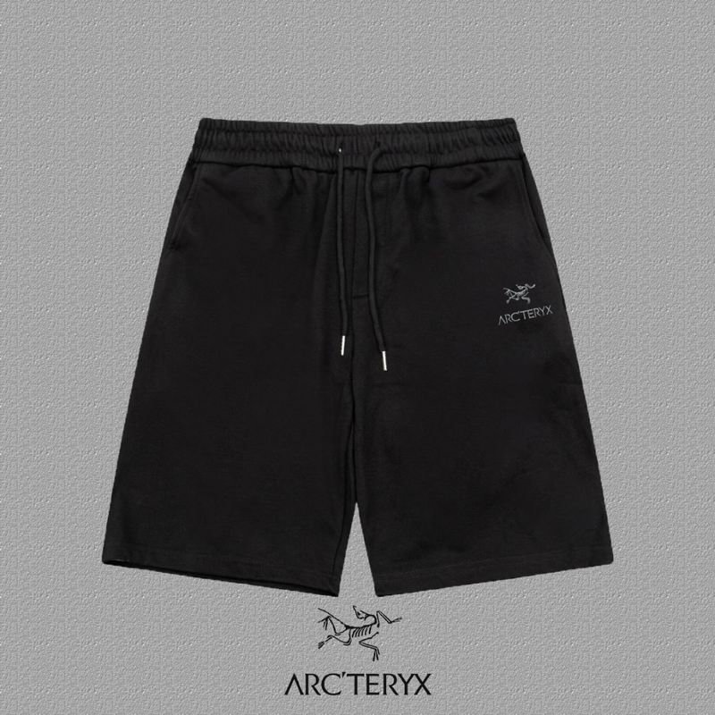 Black Arc'teryx athletic lifestyle shorts with white logo embroidery on the left leg, featuring an adjustable drawstring waistband and side pockets.