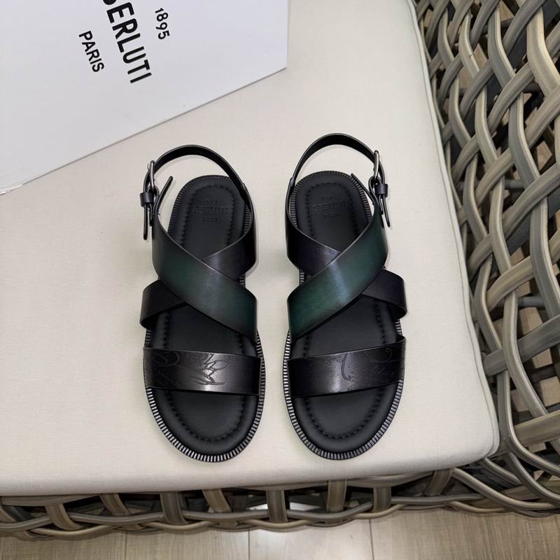 Top-down view of Berluti Cross sandals featuring a forest green patina leather strap, black Scritto engraved straps, and a thick black comfort sole on a light surface.