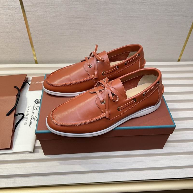 A pair of smooth cedar brown leather Summer Walk boat shoes with white rubber soles and matching leather laces, displayed on an orange branded box.